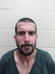 Mugshot of olmo, nestor truman